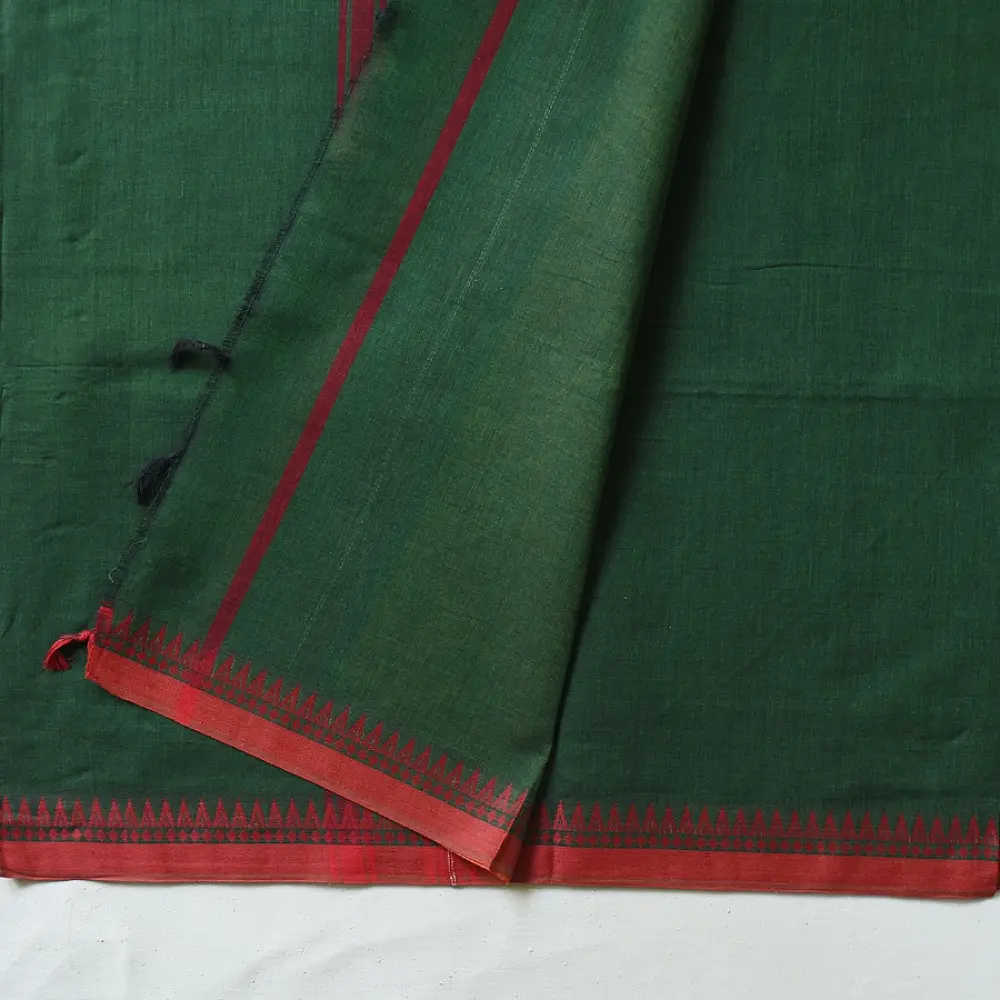 handloom begampuri pure cotton saree in forest green with red and mustard yellow woven temple borders and tassel fringe