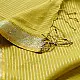 handloom pure cotton saree in subtle olivish mustard yellow featuring delicate micro stripes a woven silver zari border and soft beige handcrafted tassels