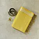 handloom pure cotton saree in subtle olivish mustard yellow featuring delicate micro stripes a woven silver zari border and soft beige handcrafted tassels
