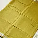 handloom pure cotton saree in subtle olivish mustard yellow featuring delicate micro stripes a woven silver zari border and soft beige handcrafted tassels