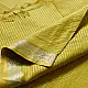 handloom pure cotton saree in subtle olivish mustard yellow featuring delicate micro stripes a woven silver zari border and soft beige handcrafted tassels