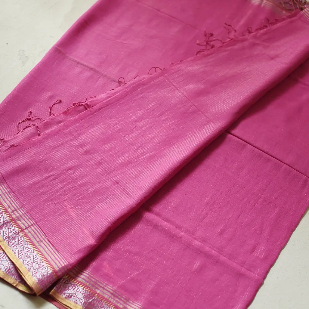 handloom pure cotton saree in soft lotus pink featuring an intricate golden zari woven patterned border and matching handcrafted tassels on pallu   