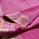 handloom pure cotton saree in soft lotus pink featuring an intricate golden zari woven patterned border and matching handcrafted tassels on pallu   