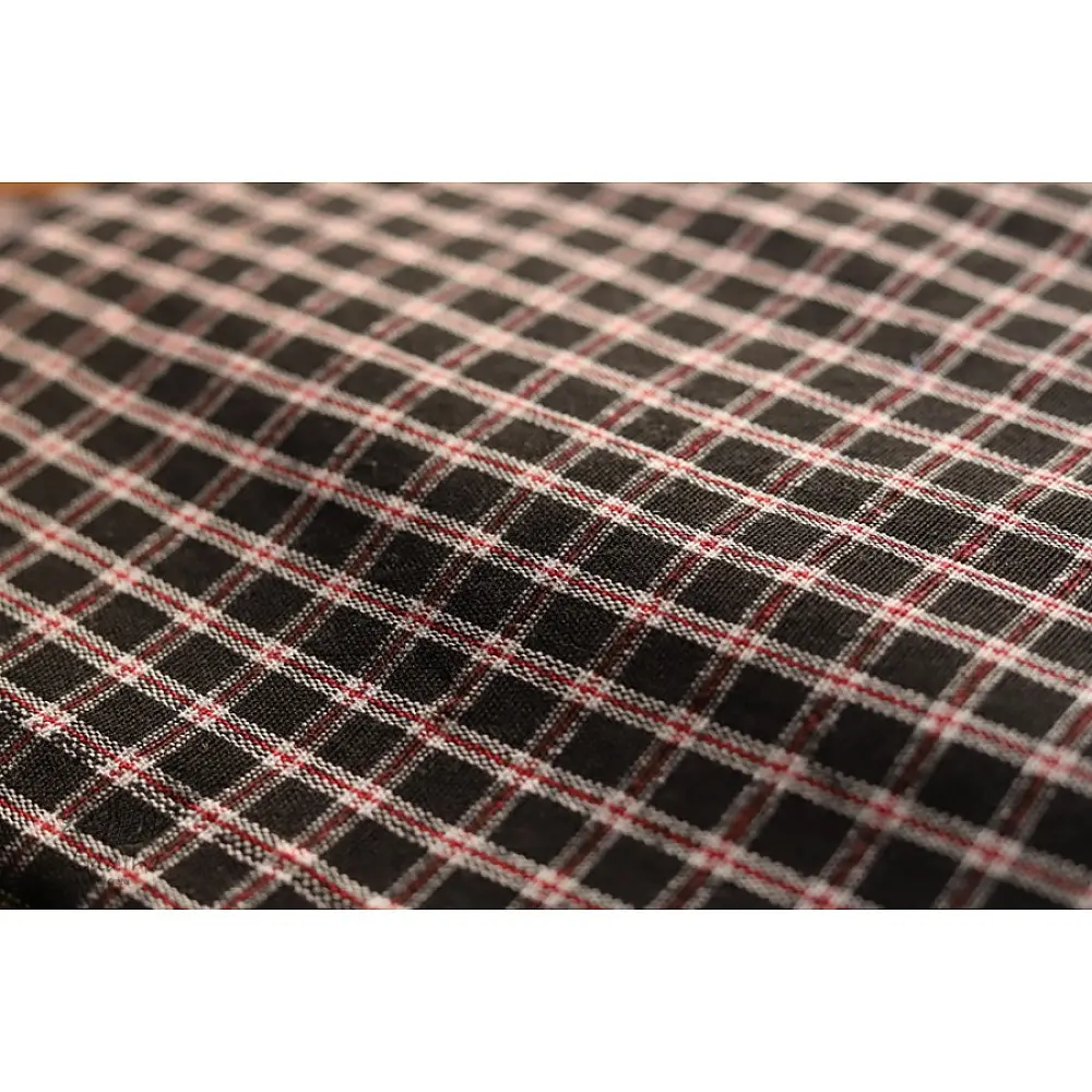 plaid pattern handcrafted cotton iPad cover sleeve for 10.5 inch tablet displayed next to glasses and a notebook on a workspace desk