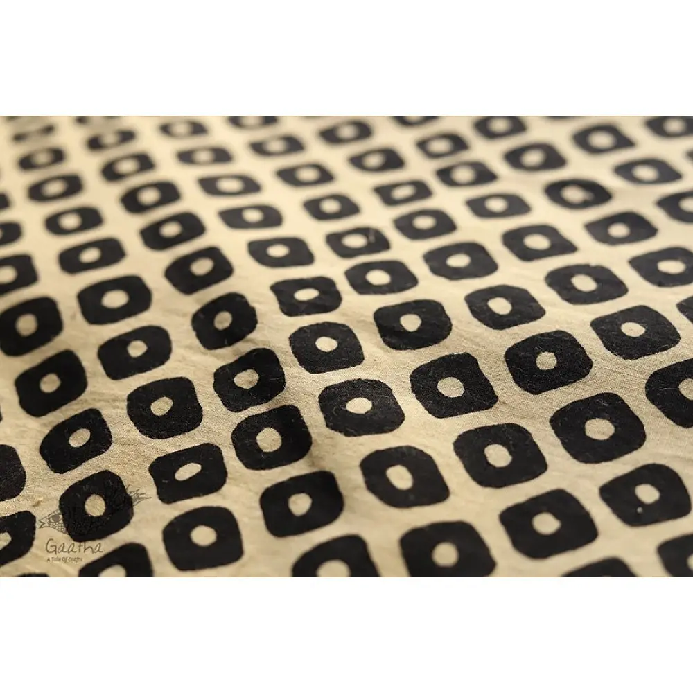 beige cotton iPad cover with black block-printed rounded square geometric motif