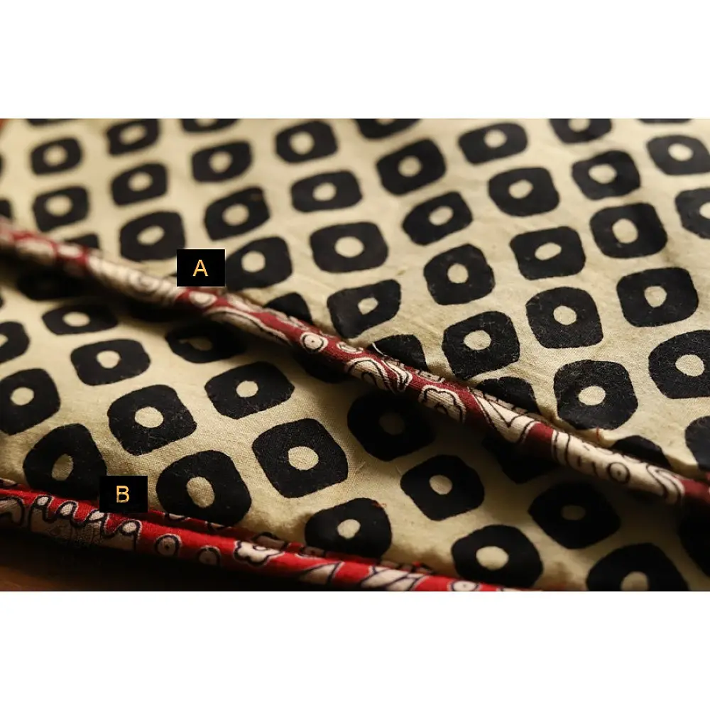 beige cotton iPad cover with black block-printed rounded square geometric motif