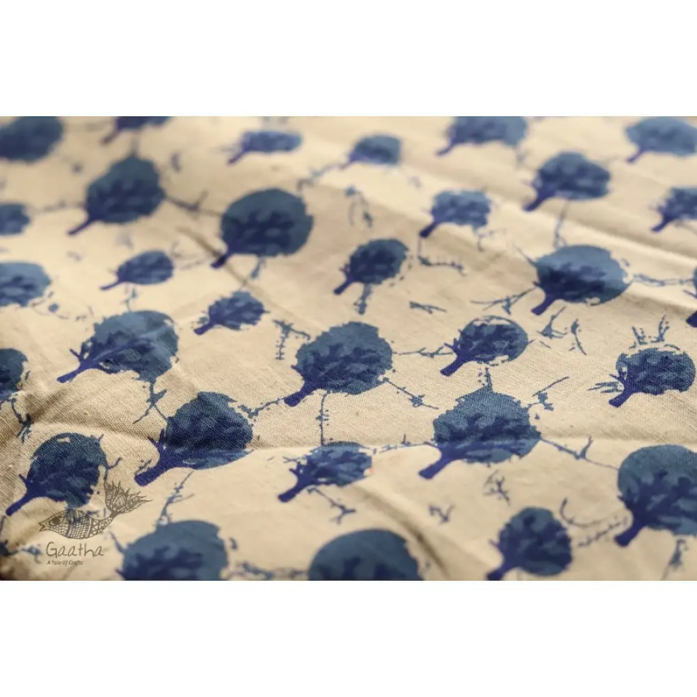 beige cotton iPad cover with indigo blue block-printed tree motif and polka dot border