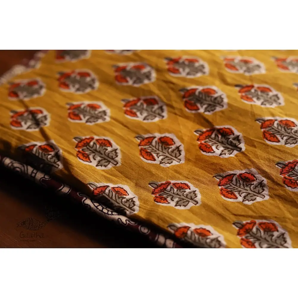 mustard yellow cotton iPad cover with grey and orange leaf print and dark contrast border