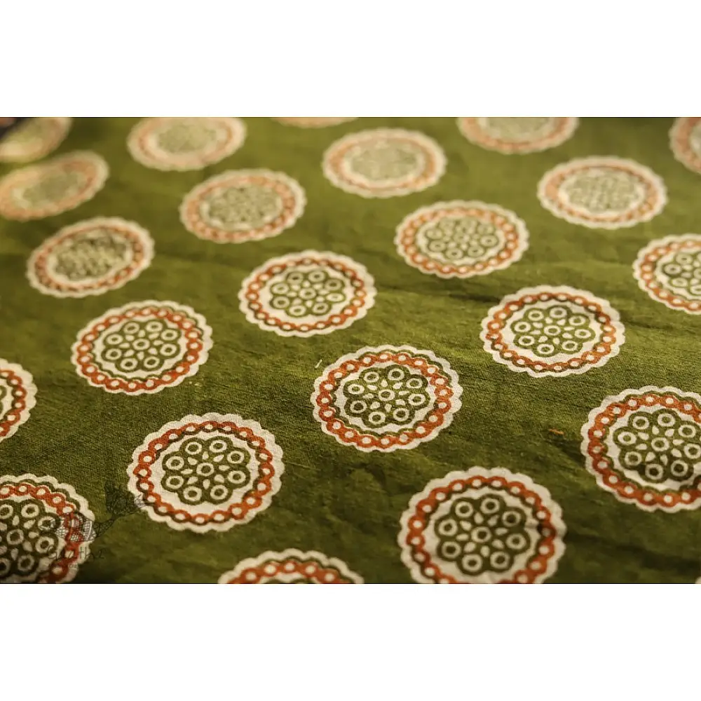 olive green cotton iPad cover with white and rust circular medallion print and polka dot border