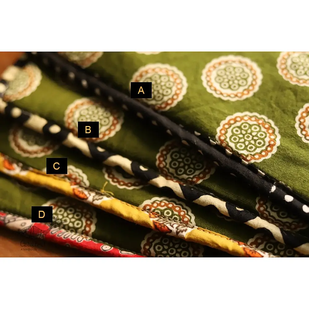 olive green cotton iPad cover with white and rust circular medallion print and polka dot border