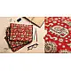 red cotton iPad cover with white block-printed elephant and paisley motifs and polka dot border
