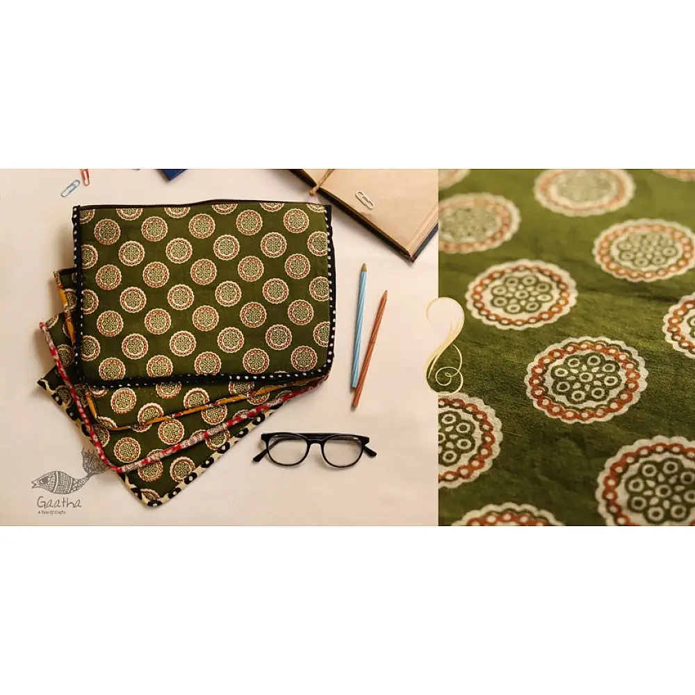 olive green cotton iPad cover with white and rust circular medallion print and polka dot border