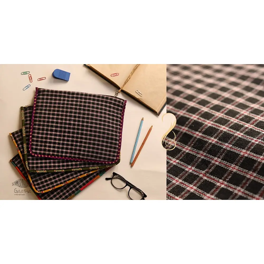 plaid pattern handcrafted cotton iPad cover sleeve for 10.5 inch tablet displayed next to glasses and a notebook on a workspace desk
