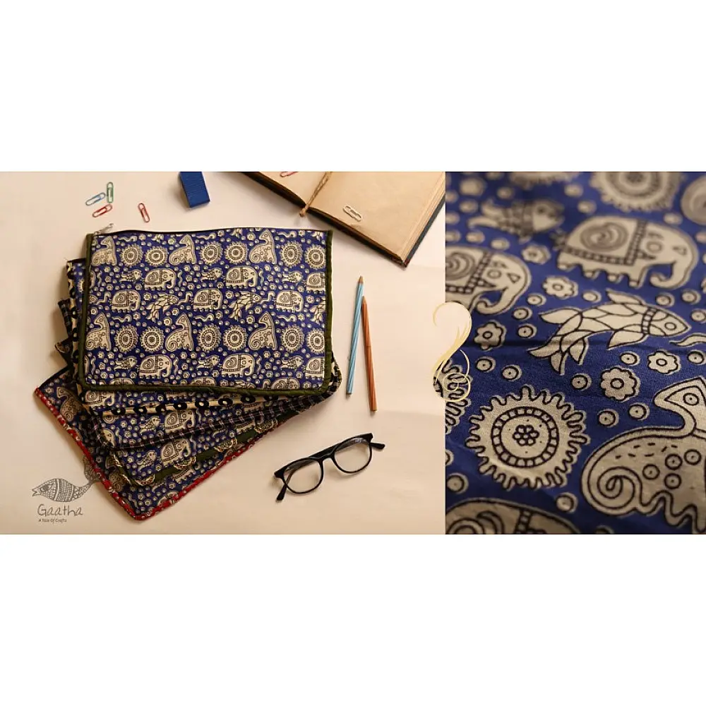 blue cotton iPad cover with white block-printed elephant and paisley motifs and contrast border