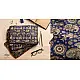 blue cotton iPad cover with white block-printed elephant and paisley motifs and contrast border