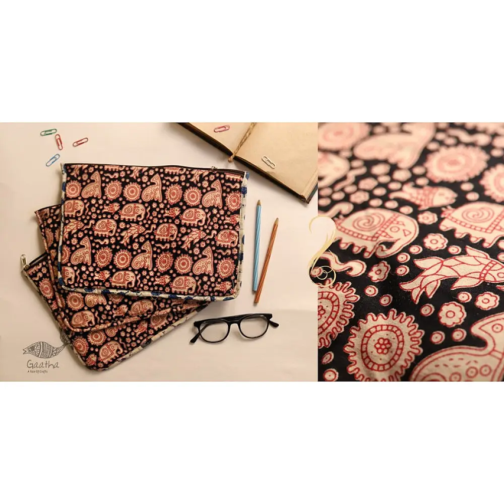 black cotton iPad cover with pink block-printed elephant and paisley motifs