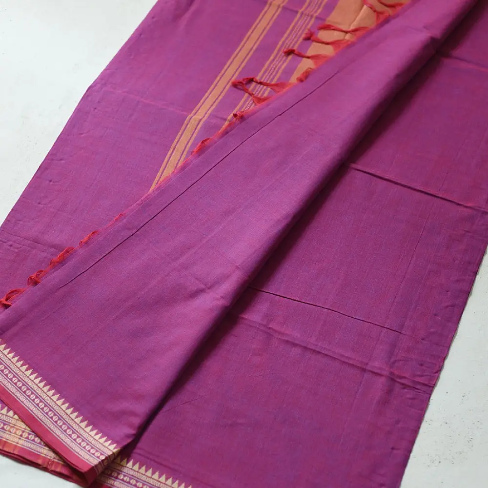 handloom begampuri pure cotton saree in vibrant magenta pink with orange and cream woven temple borders and tassel fringe