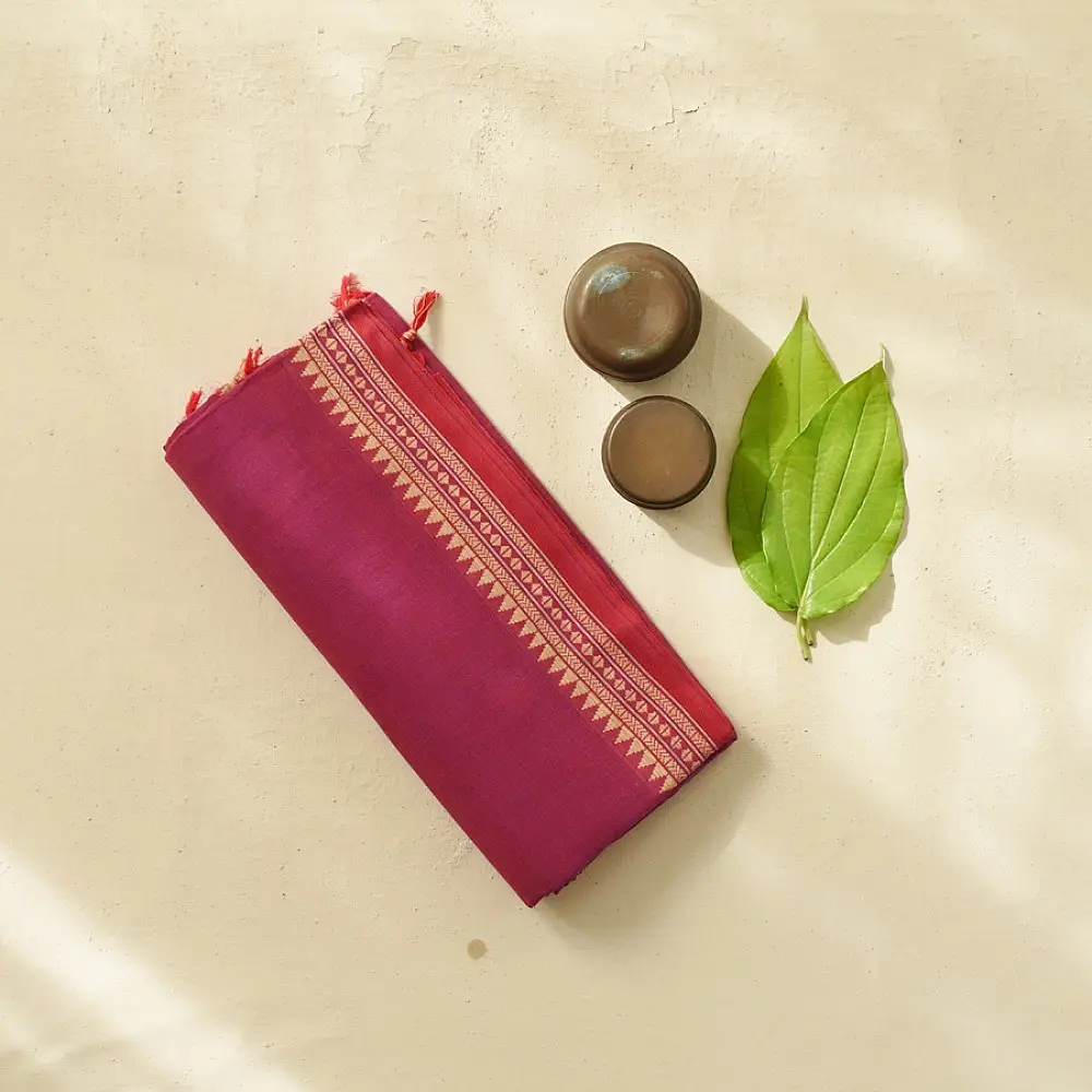 handloom begampuri pure cotton saree in vibrant magenta pink with orange and cream woven temple borders and tassel fringe