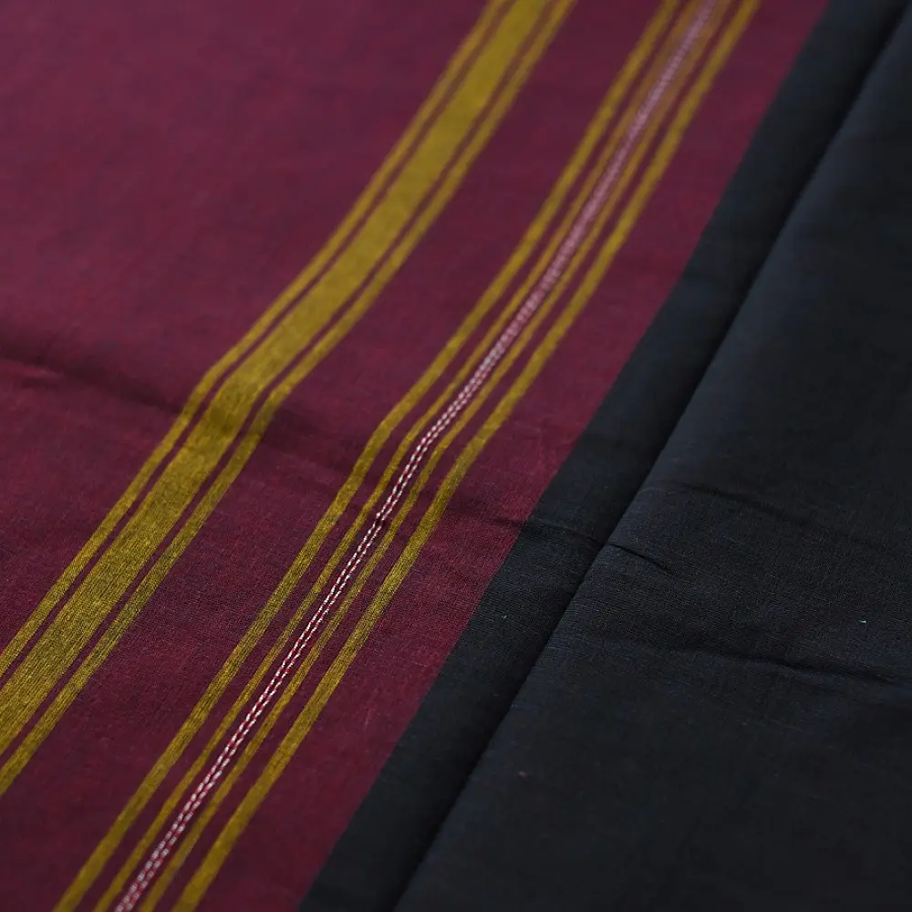 handloom begampuri pure cotton saree in deep wine maroon with mustard yellow pinstripes, black woven temple borders, and tassel fringe