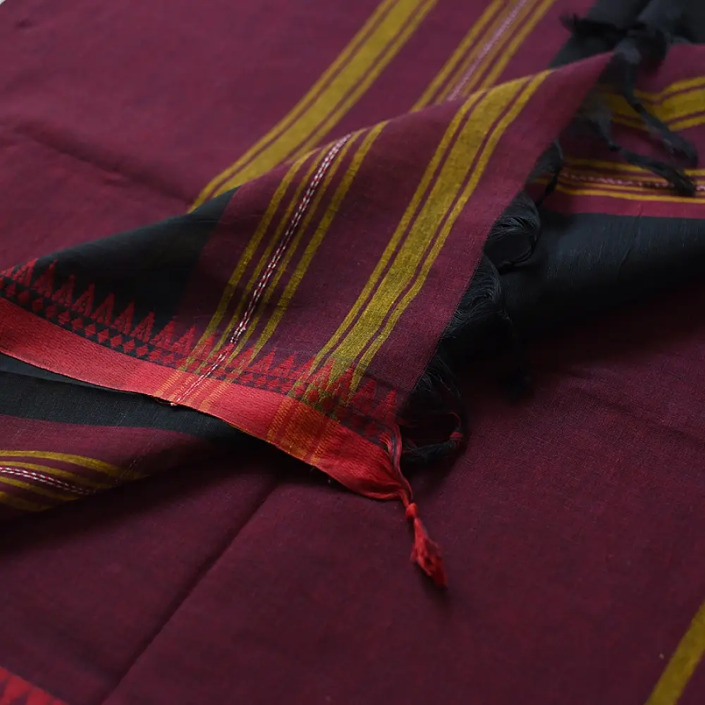 handloom begampuri pure cotton saree in deep wine maroon with mustard yellow pinstripes, black woven temple borders, and tassel fringe