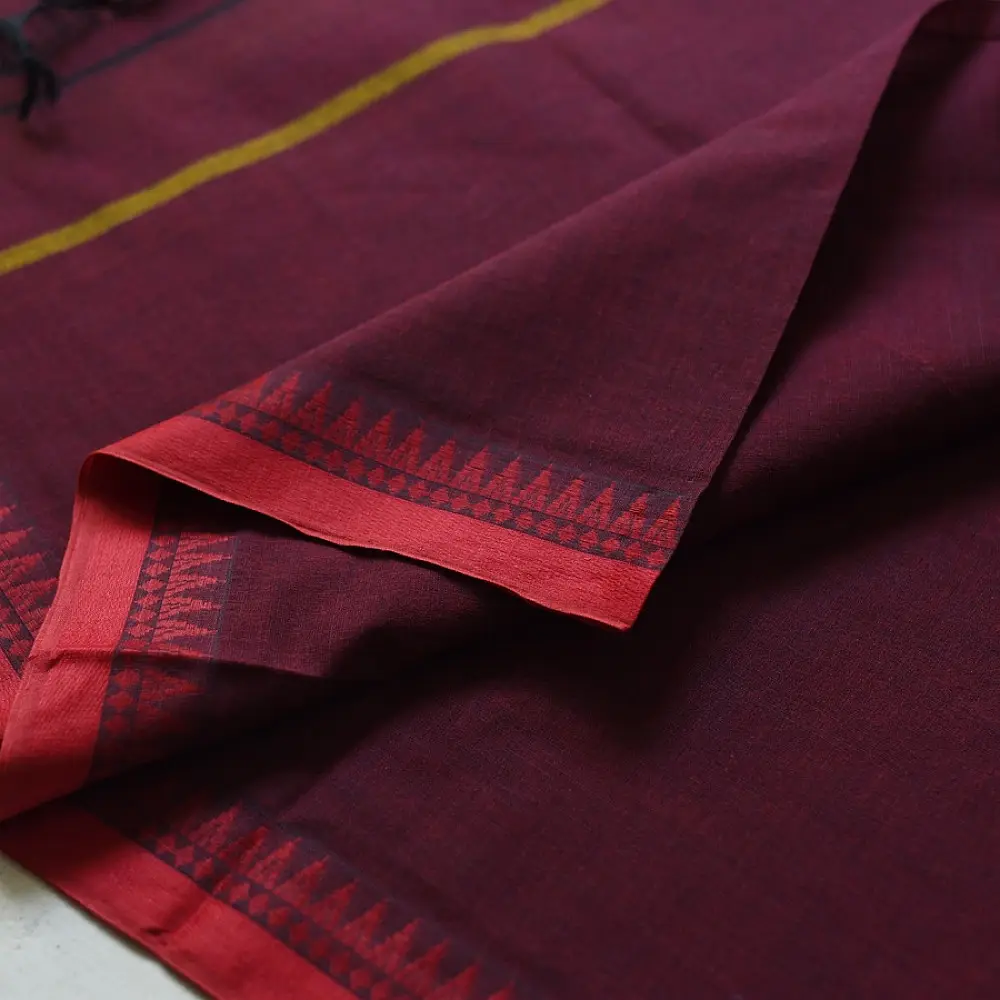 handloom begampuri pure cotton saree in deep wine maroon with mustard yellow pinstripes, black woven temple borders, and tassel fringe