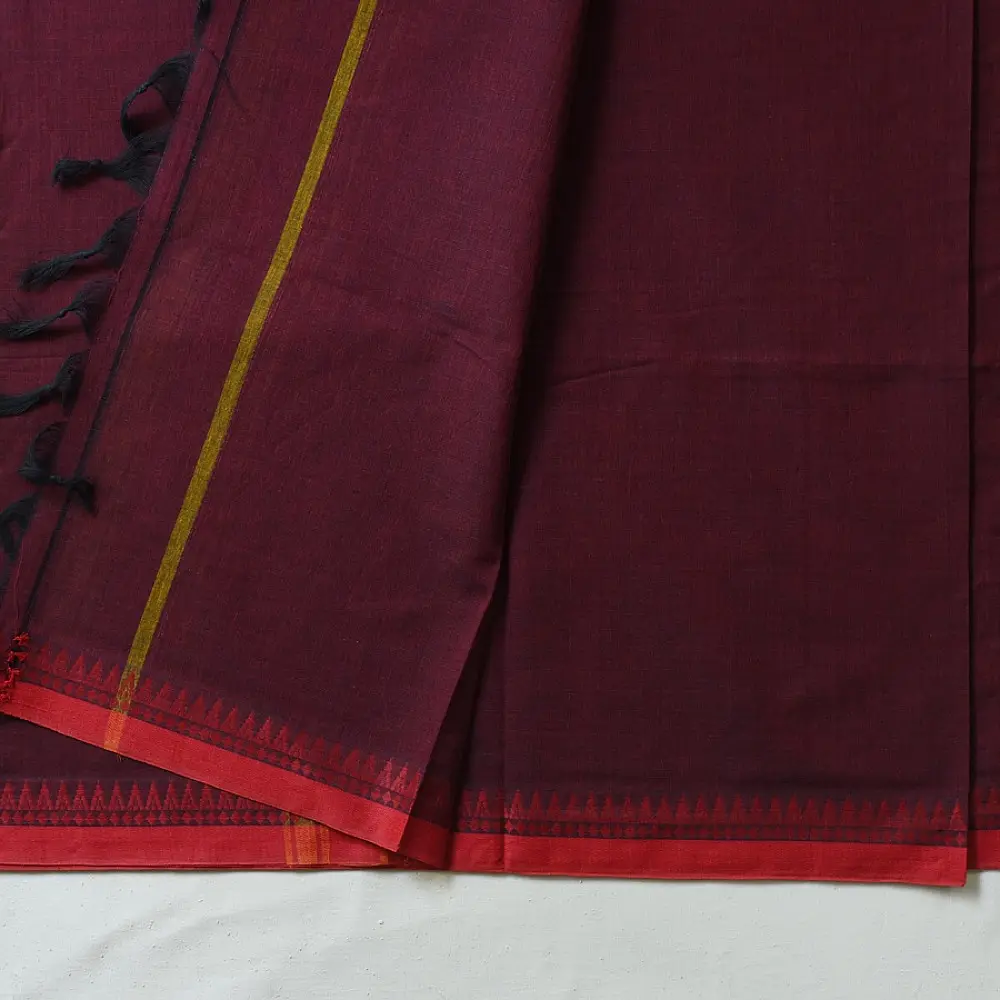 handloom begampuri pure cotton saree in deep wine maroon with mustard yellow pinstripes, black woven temple borders, and tassel fringe