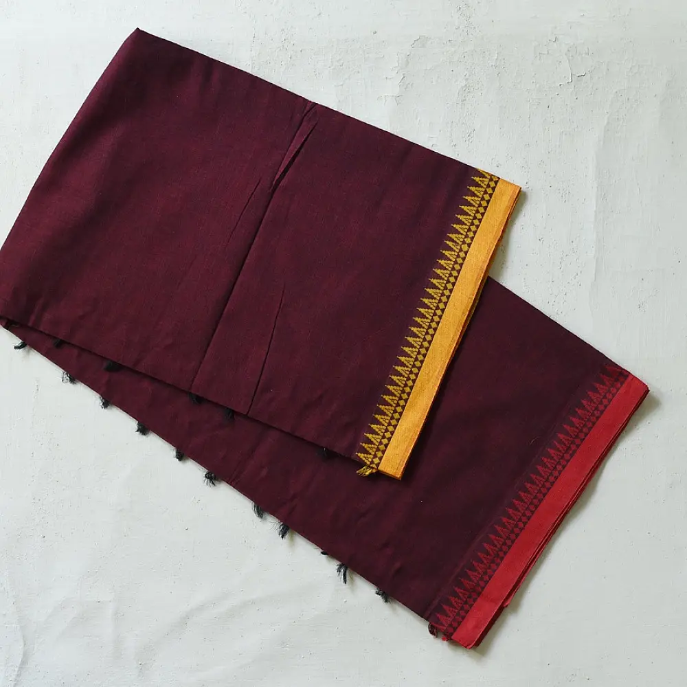 handloom begampuri pure cotton saree in deep wine maroon with mustard yellow pinstripes, black woven temple borders, and tassel fringe