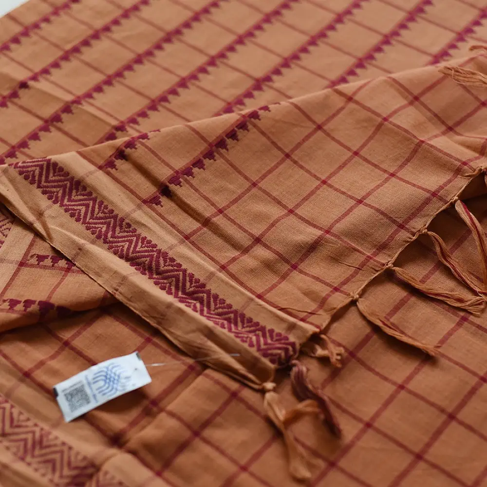 handloom begampuri pure cotton saree in rust brown with red fine grid check pattern, woven temple borders, and tassel fringe