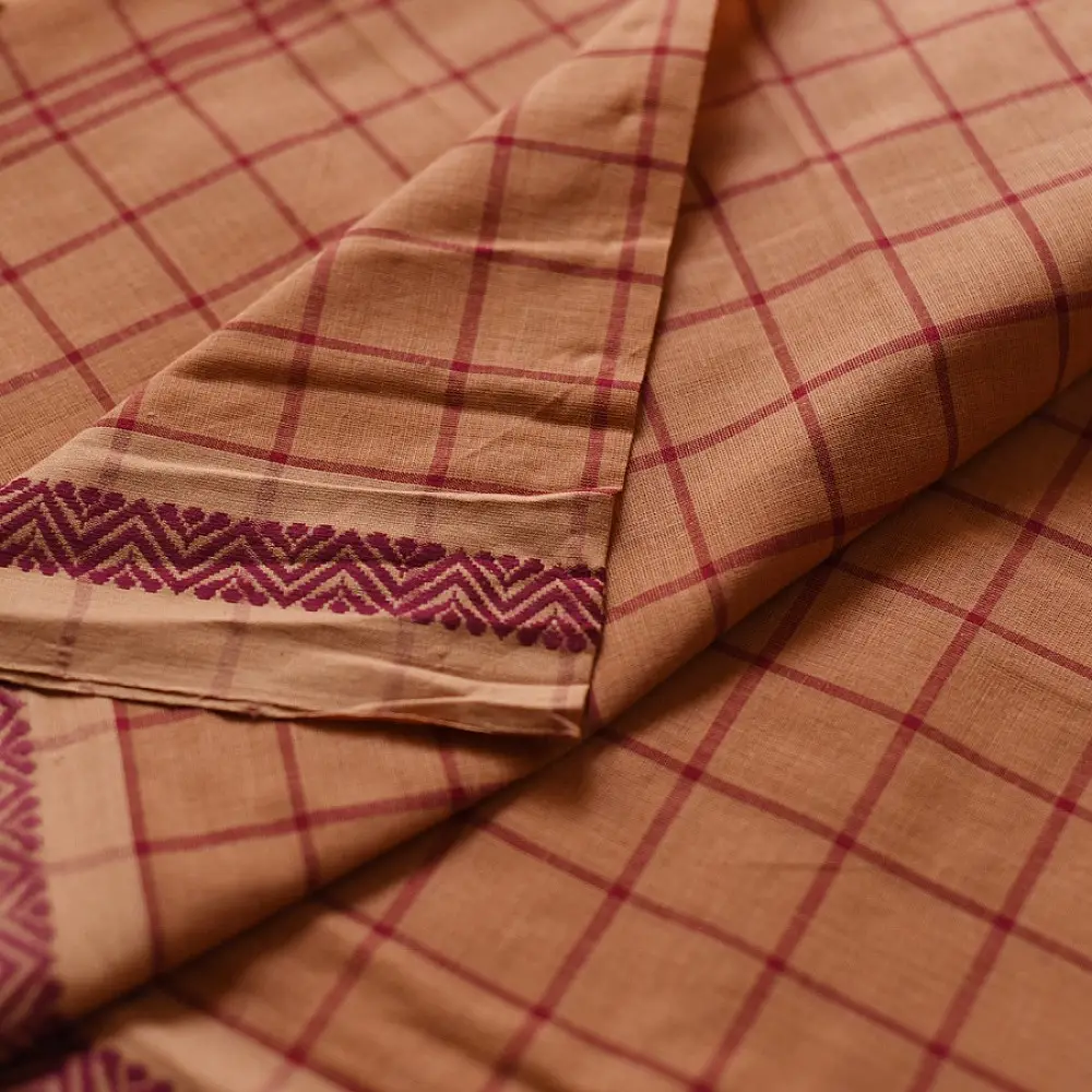 handloom begampuri pure cotton saree in rust brown with red fine grid check pattern, woven temple borders, and tassel fringe
