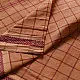 handloom begampuri pure cotton saree in rust brown with red fine grid check pattern, woven temple borders, and tassel fringe