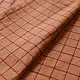 handloom begampuri pure cotton saree in rust brown with red fine grid check pattern, woven temple borders, and tassel fringe