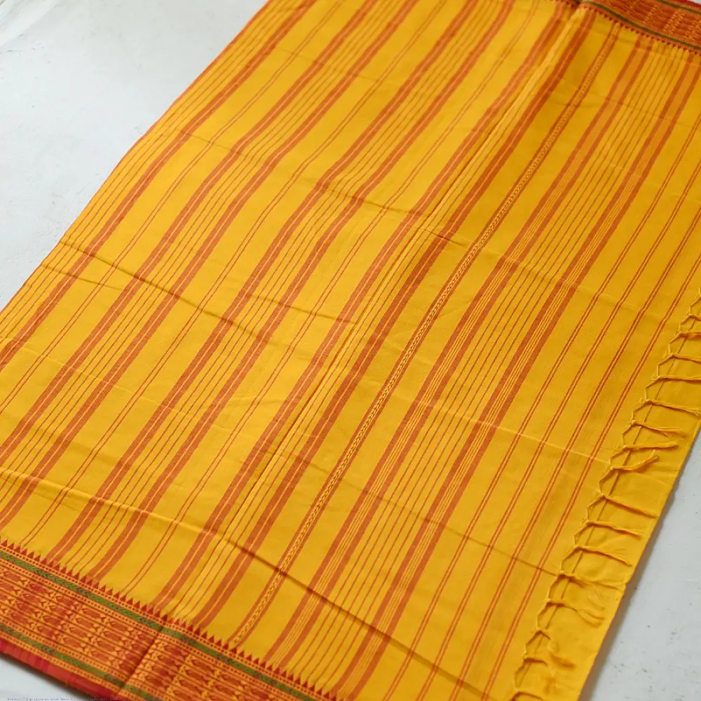handloom begampuri pure cotton saree in bright yellow with orange and green woven temple borders and tassel fringe   