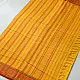 handloom begampuri pure cotton saree in bright yellow with orange and green woven temple borders and tassel fringe   