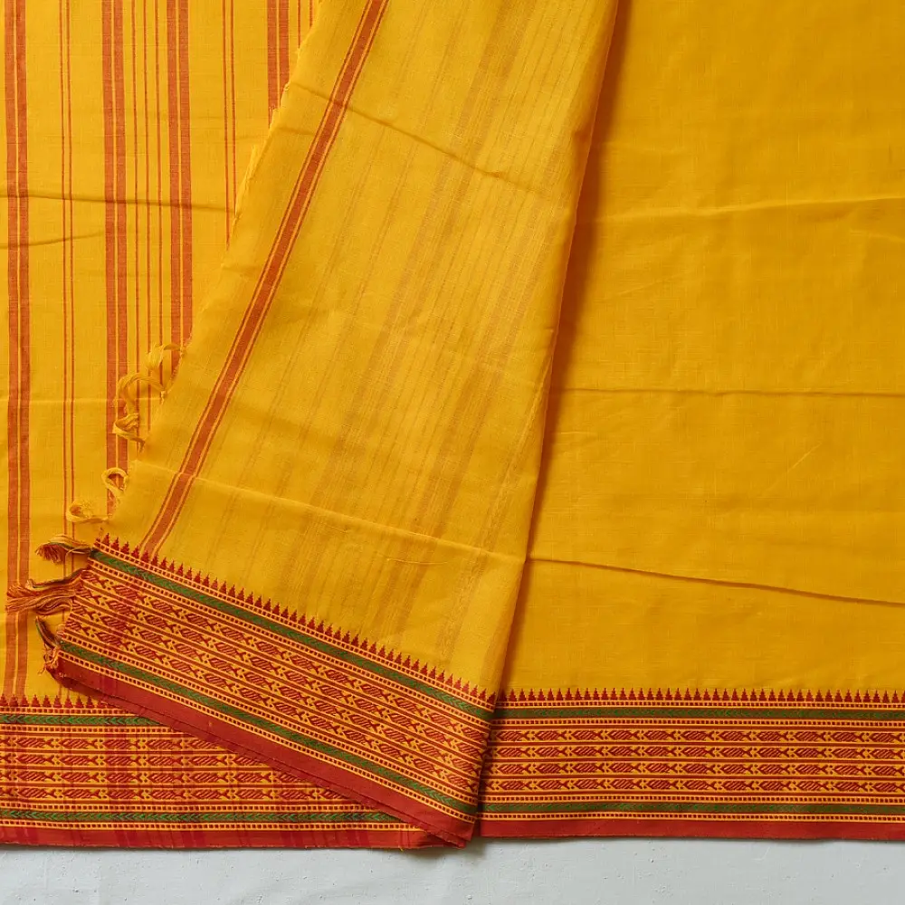 handloom begampuri pure cotton saree in bright yellow with orange and green woven temple borders and tassel fringe   