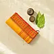 handloom begampuri pure cotton saree in bright yellow with orange and green woven temple borders and tassel fringe   