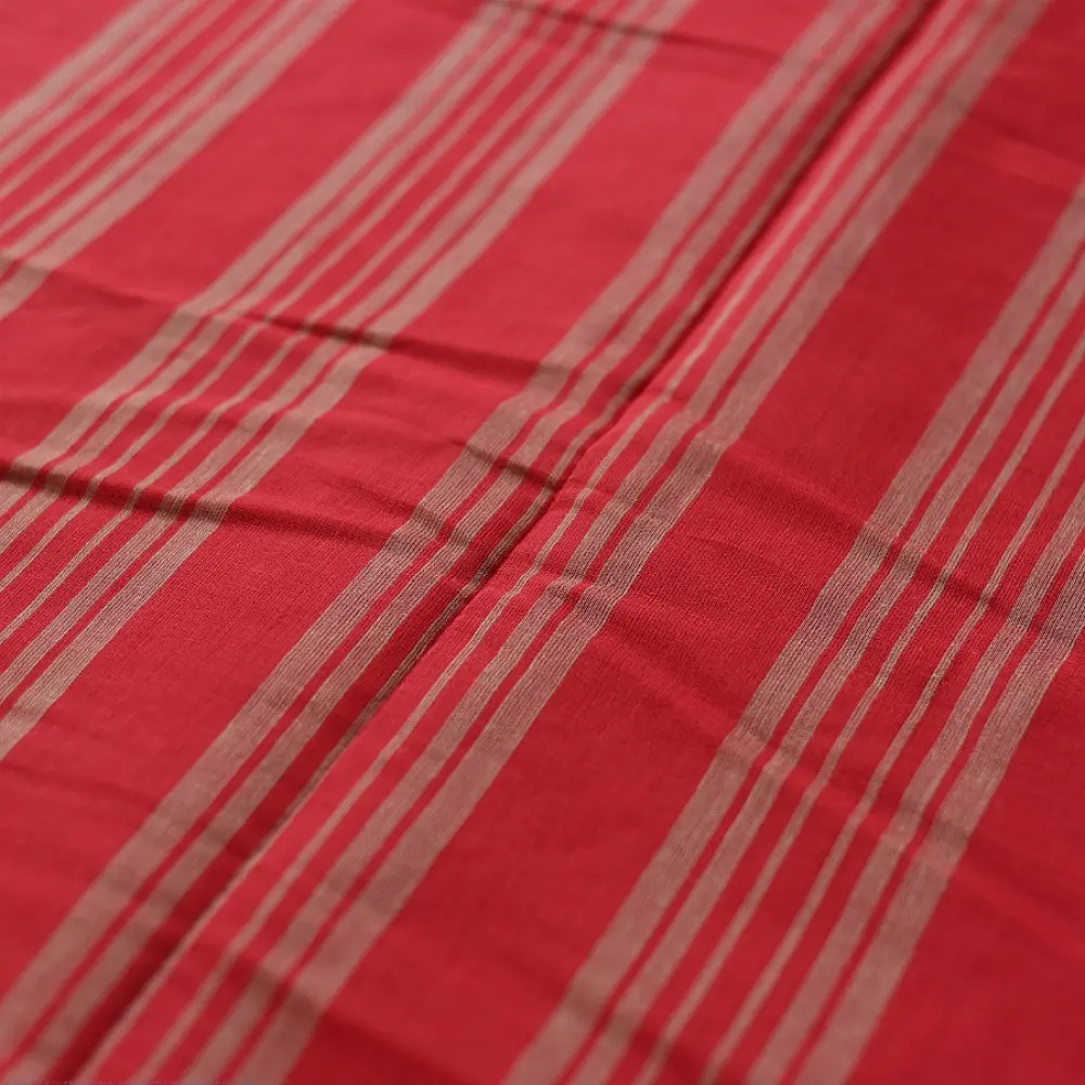 handloom begampuri pure cotton saree in bright scarlet red with fine beige pinstripes and off-white woven temple borders with fringe tassels