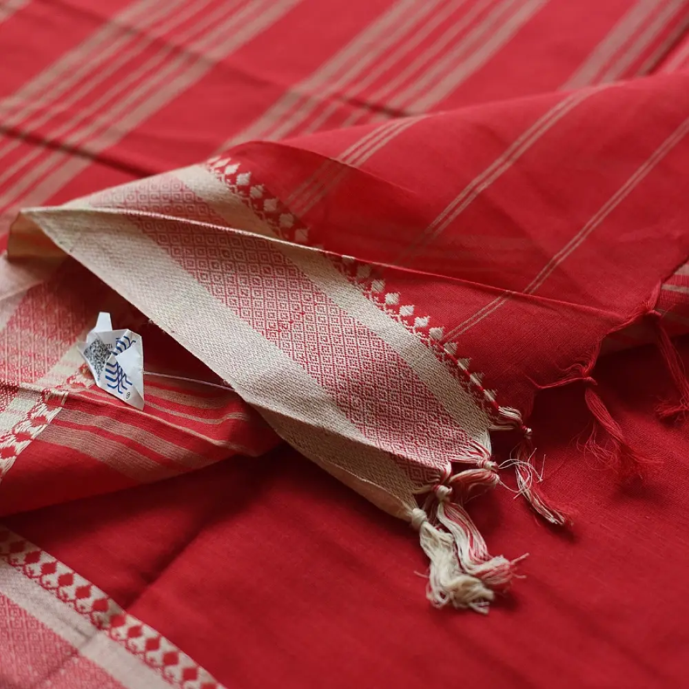 handloom begampuri pure cotton saree in bright scarlet red with fine beige pinstripes and off-white woven temple borders with fringe tassels