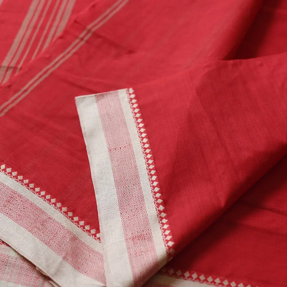 handloom begampuri pure cotton saree in bright scarlet red with fine beige pinstripes and off-white woven temple borders with fringe tassels