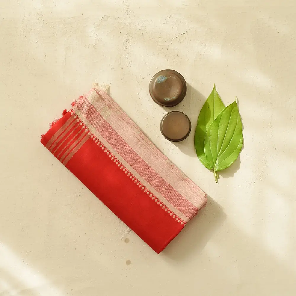 handloom begampuri pure cotton saree in bright scarlet red with fine beige pinstripes and off-white woven temple borders with fringe tassels