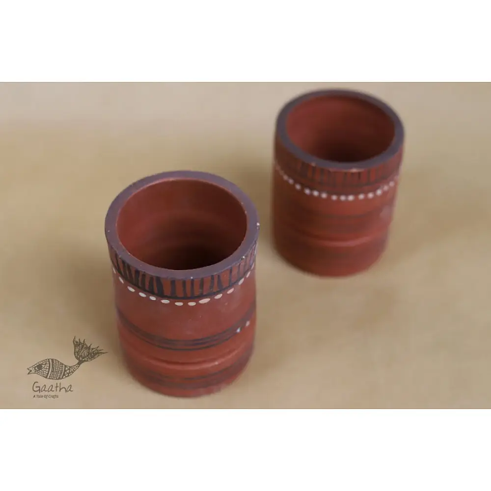 handmade terracotta clay glasses set of two with hand painted traditional tribal white and black line motifs