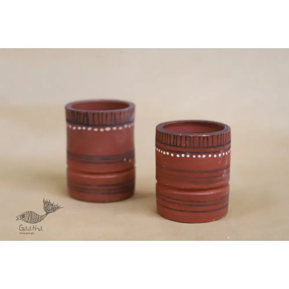 handmade terracotta clay glasses set of two with hand painted traditional tribal white and black line motifs