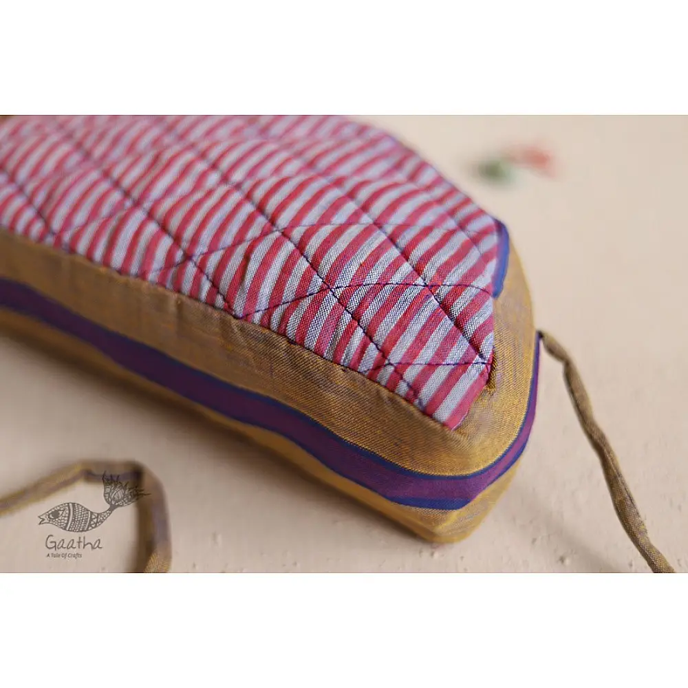 handcrafted camel shaped cotton pouch featuring a pink diamond quilted saddle panel and long fabric strap