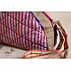 handcrafted camel shaped cotton pouch featuring a pink diamond quilted saddle panel and long fabric strap