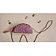 handcrafted camel shaped cotton pouch featuring a pink diamond quilted saddle panel and long fabric strap