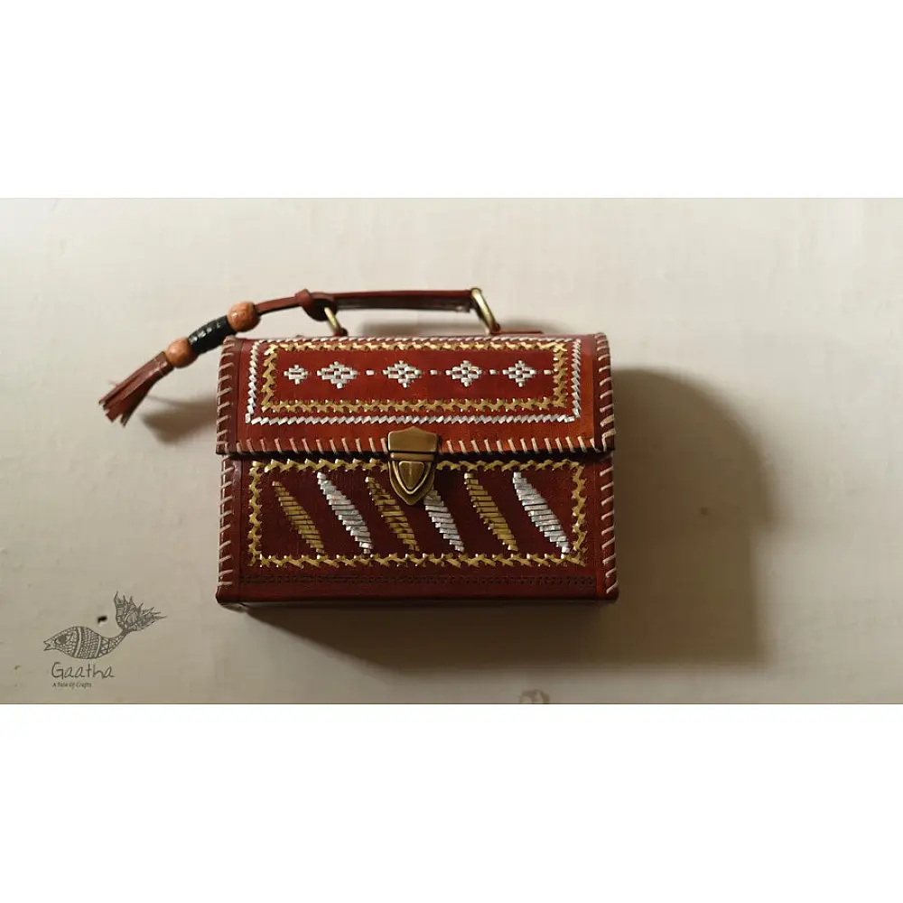 shop Kutchi Leather Sling Handbag