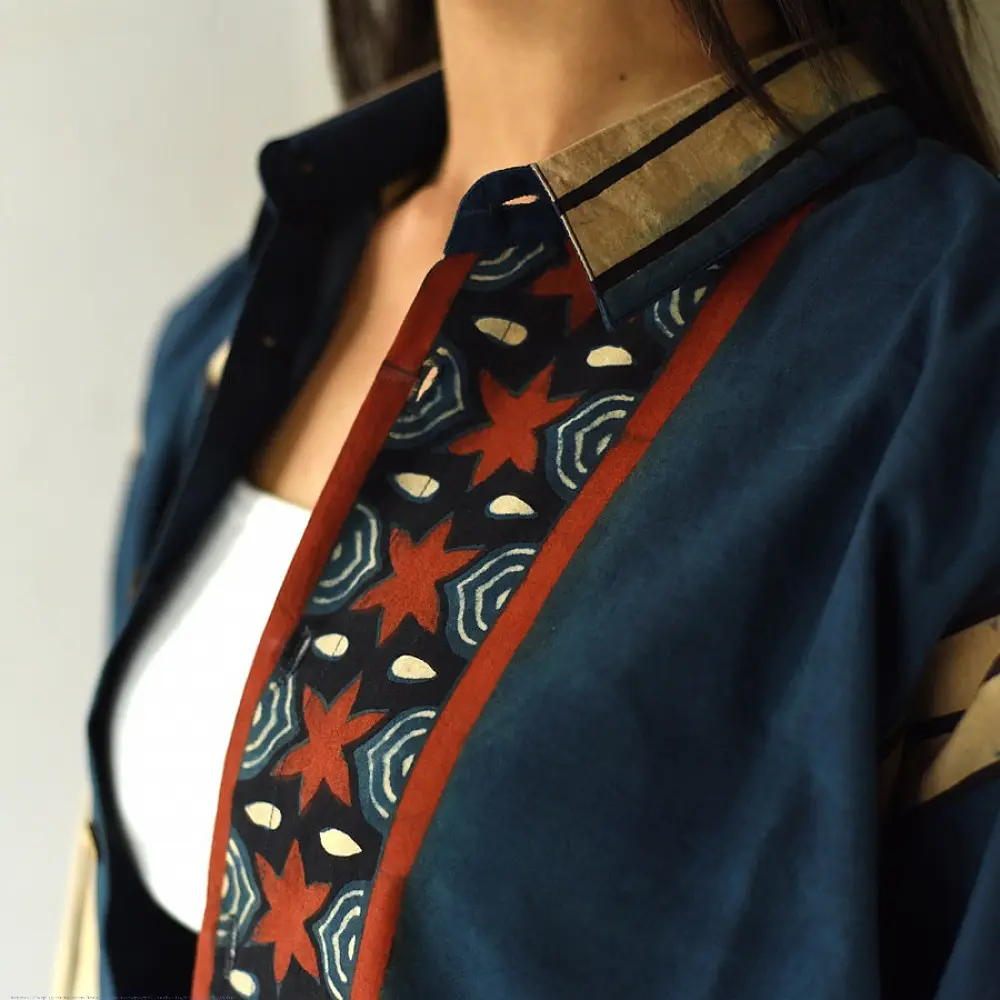 handblock printed men cotton shirt in deep indigo blue with a central geometric star motif panel off white stripes and wooden buttons