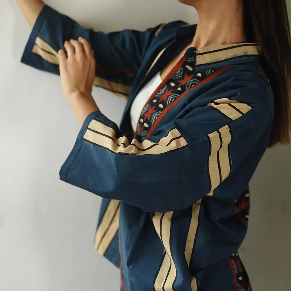 handblock printed men cotton shirt in deep indigo blue with a central geometric star motif panel off white stripes and wooden buttons