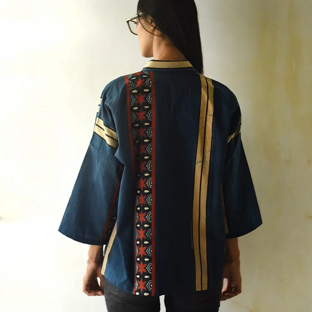 handblock printed men cotton shirt in deep indigo blue with a central geometric star motif panel off white stripes and wooden buttons