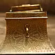 handmade square brass dabro storage box with flared base front clasp and hand engraved patterns