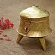 handmade traditional brass paan daan featuring three sturdy tripod legs, a hand-engraved dome lid, and a secure metal latch closure